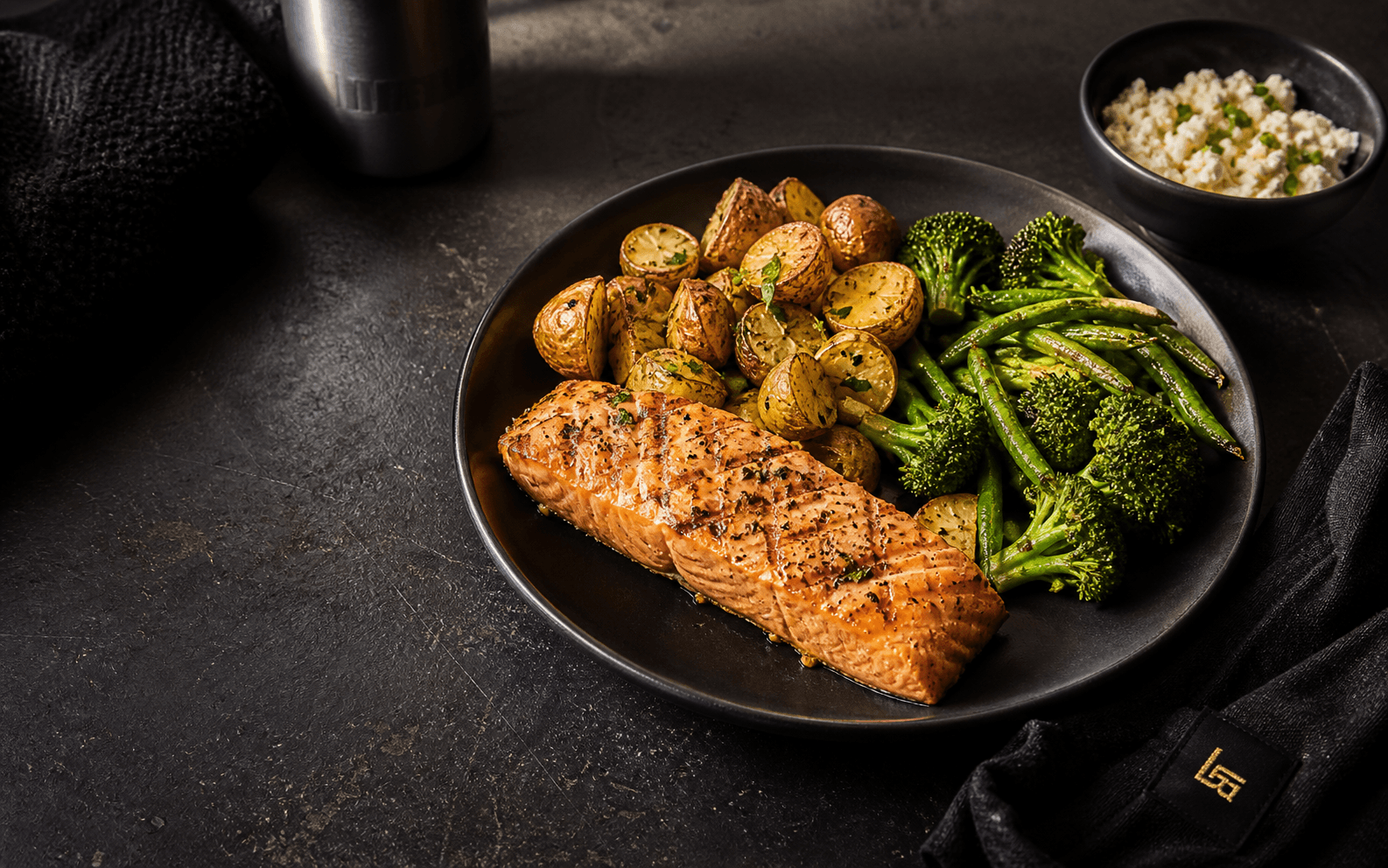 Salmon, roasted potatoes, and vegetables prepared as part of a Long Road Fitness meal plan